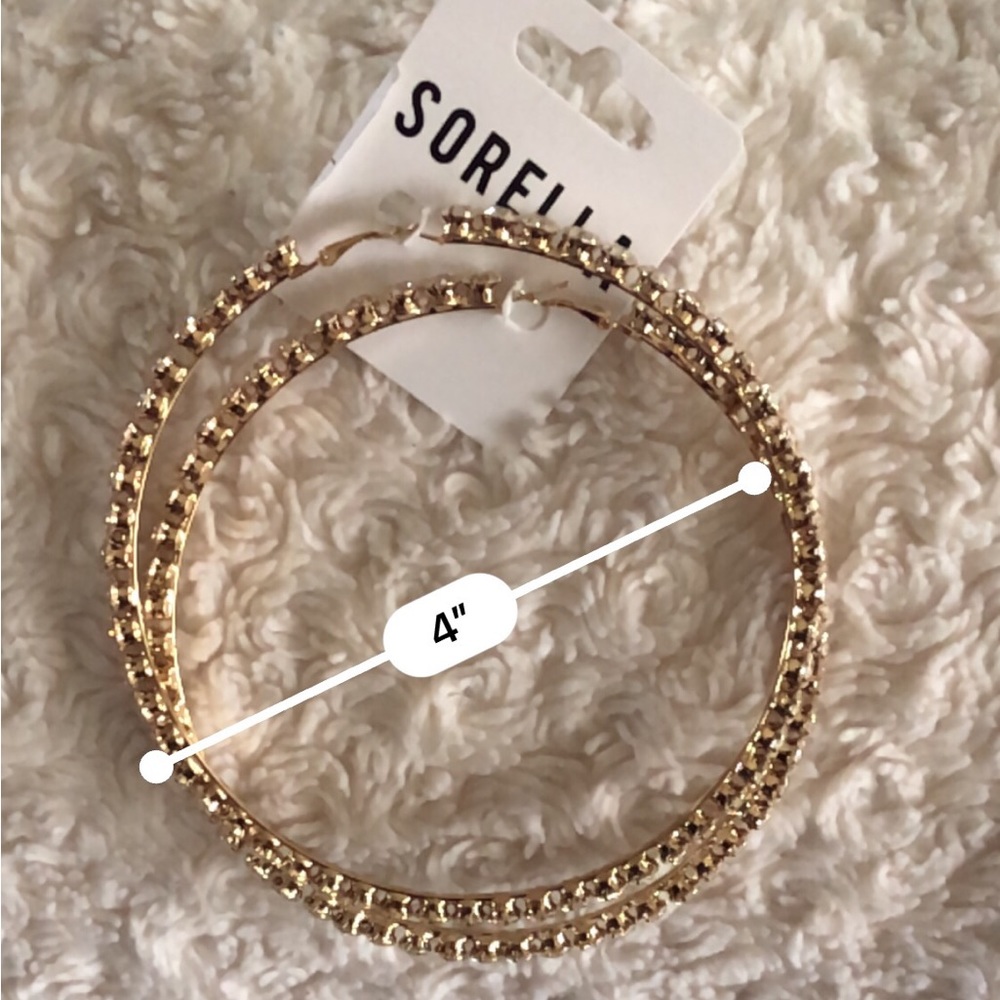 Hoop fashion earrings. 4”. Faux diamond. Gold color